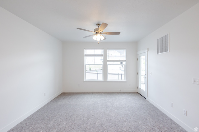 693 West 4500th South, Unit O101 Mapleton, UT 84664 - Photo 15 of 16 Unfurnished room with light colored carpet and a ceiling fan
