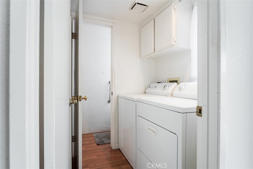 7040 Marino Place Rancho Cucamonga, CA 91701 - Photo 14 of 45 a utility room with dryer and washer