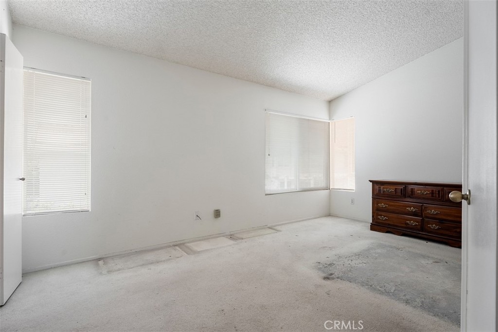 7040 Marino Place Rancho Cucamonga, CA 91701 - Photo 18 of 45 an empty room with a window