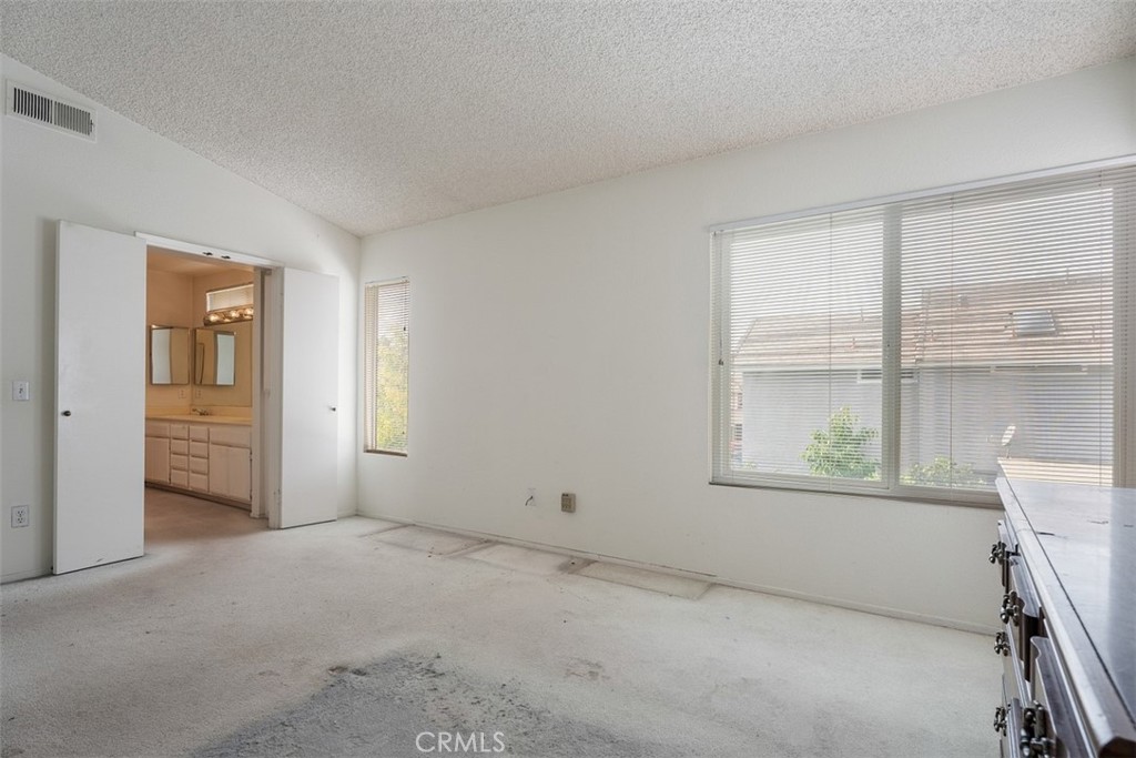 7040 Marino Place Rancho Cucamonga, CA 91701 - Photo 19 of 45 a view of an empty room with a window
