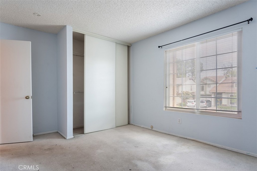 7040 Marino Place Rancho Cucamonga, CA 91701 - Photo 26 of 45 a view of an empty room with a window
