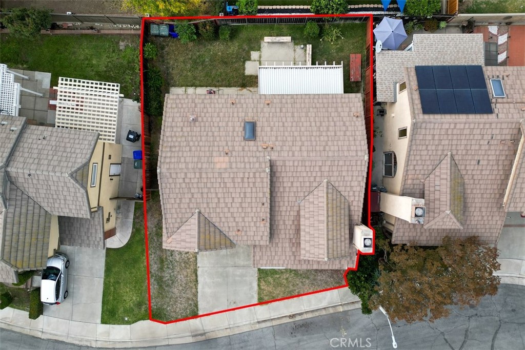 7040 Marino Place Rancho Cucamonga, CA 91701 - Photo 36 of 45 an aerial view of a house with a yard