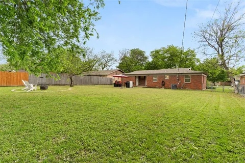 a front view of house with yard