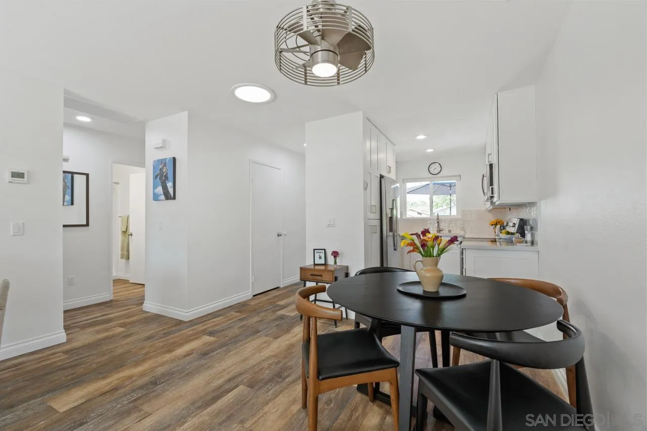 1628 Forestdale Drive Encinitas, CA 92024 - Photo 12 of 39 a view of a dining room with furniture and wooden floor
