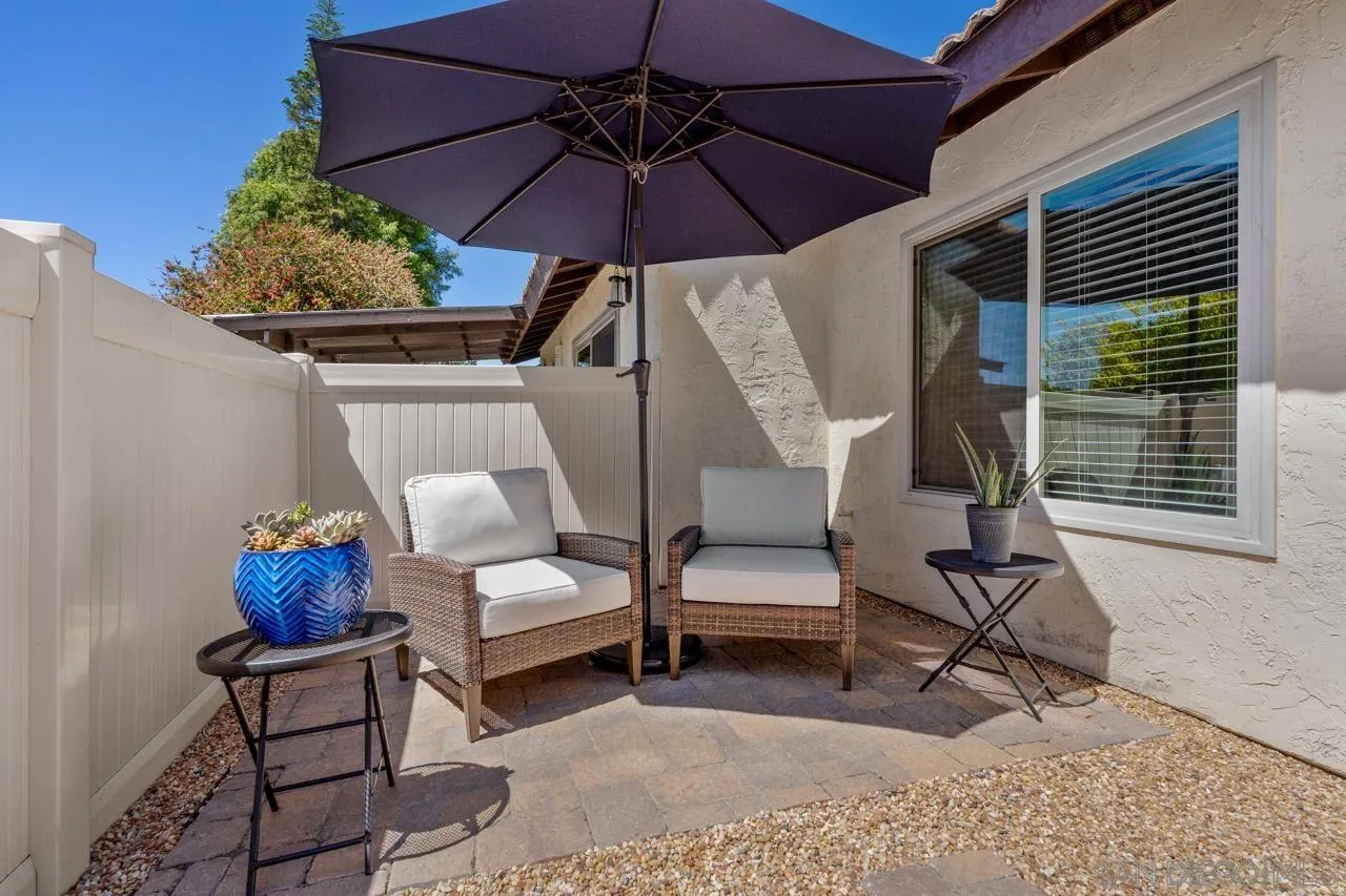 1628 Forestdale Drive Encinitas, CA 92024 - Photo 28 of 39 a view of living room filled with furniture and a umbrella