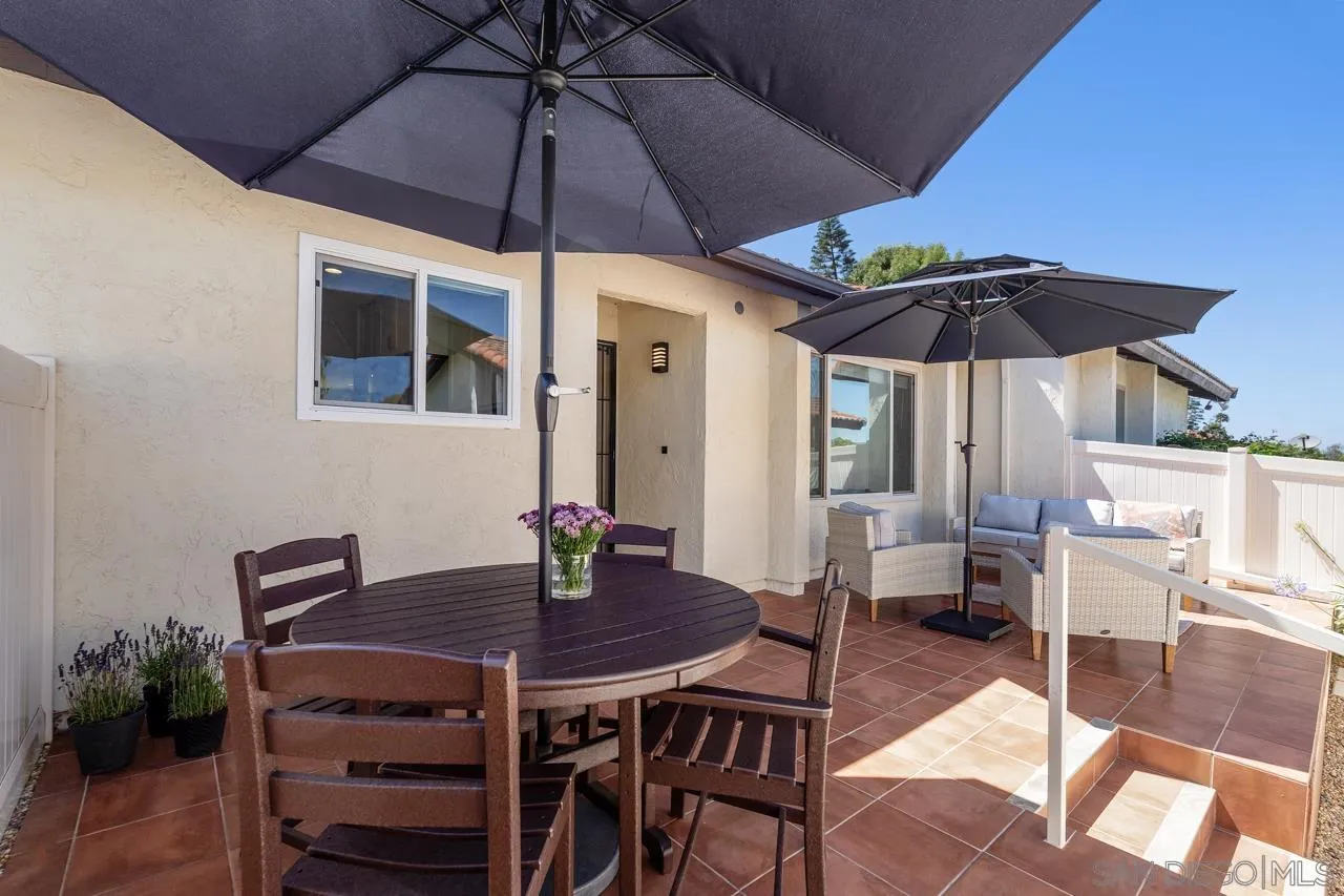1628 Forestdale Drive Encinitas, CA 92024 - Photo 4 of 39 a table and chairs in patio