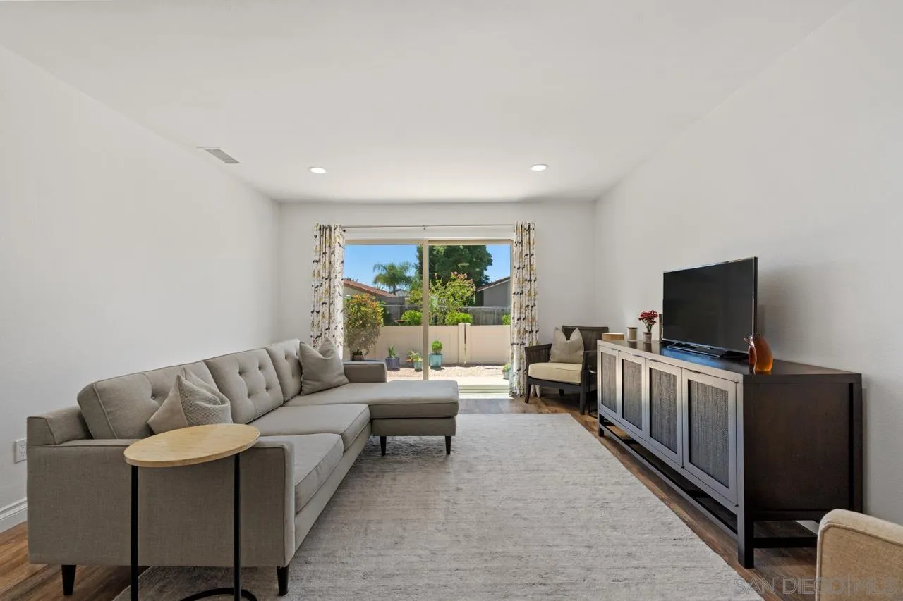 1628 Forestdale Drive Encinitas, CA 92024 - Photo 6 of 39 a living room with furniture and a flat screen tv