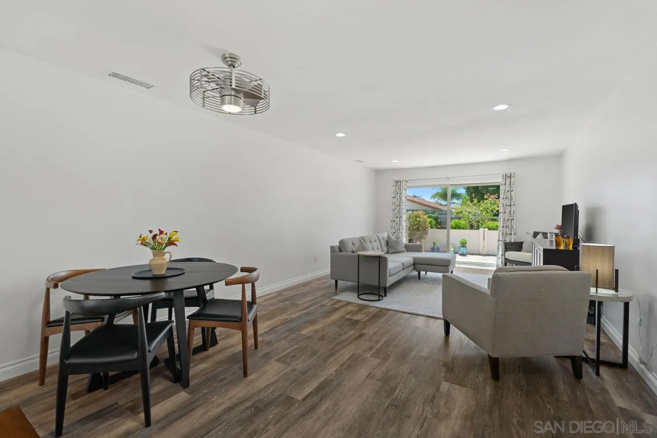 1628 Forestdale Drive Encinitas, CA 92024 - Photo 7 of 39 a living room with furniture a window and a dining table
