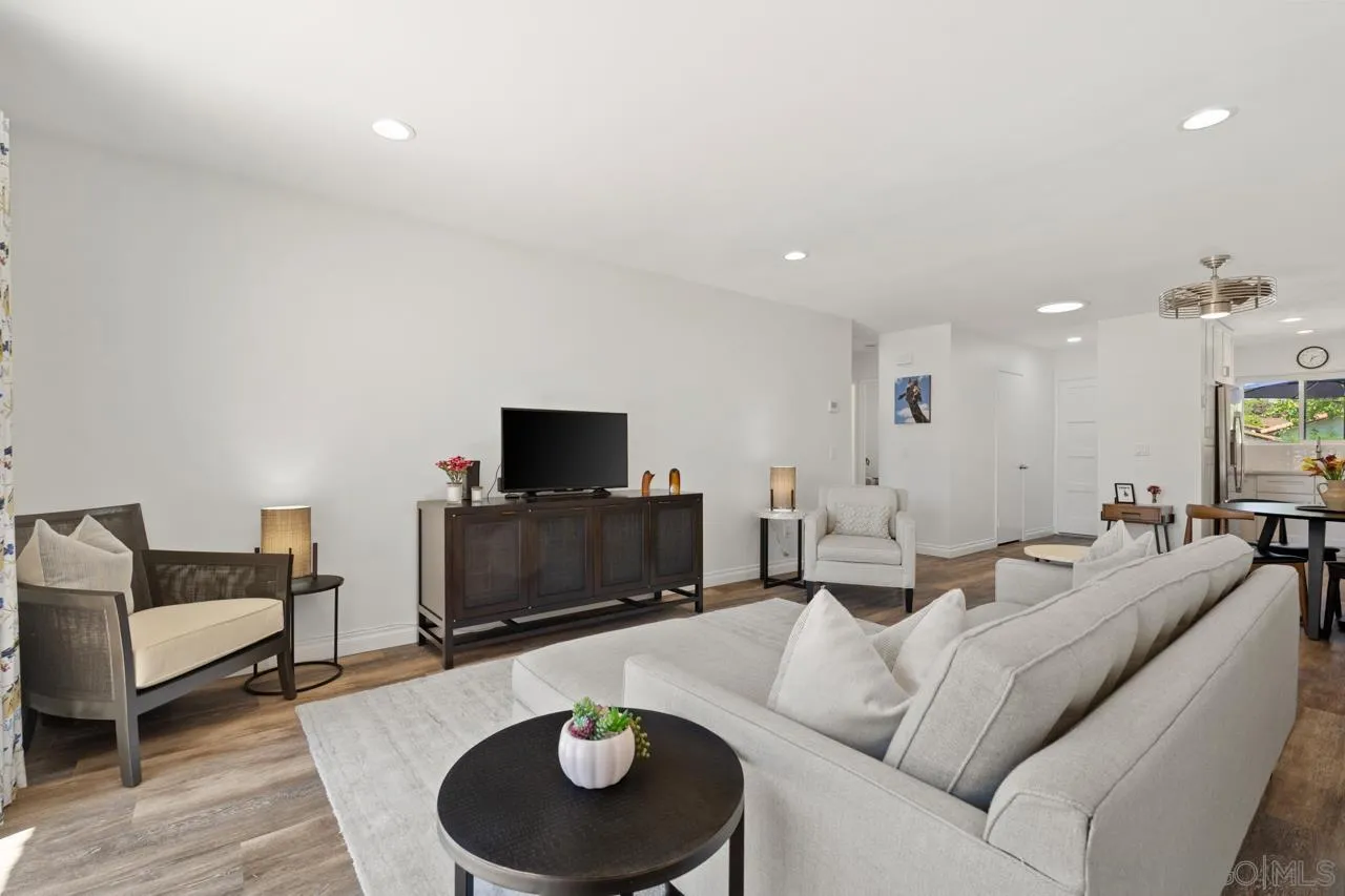 1628 Forestdale Drive Encinitas, CA 92024 - Photo 9 of 39 a living room with furniture and a flat screen tv