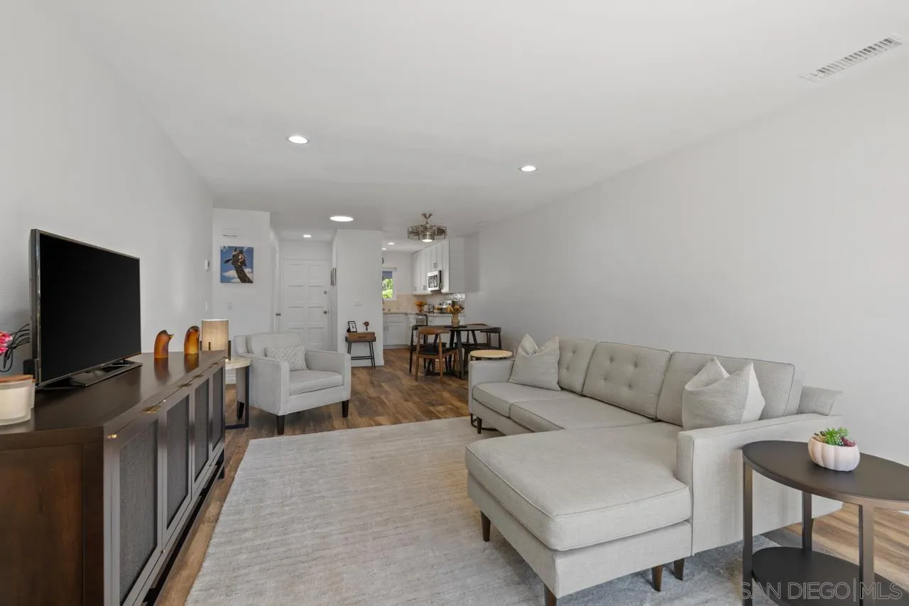 1628 Forestdale Drive Encinitas, CA 92024 - Photo 10 of 39 a living room with furniture and a flat screen tv