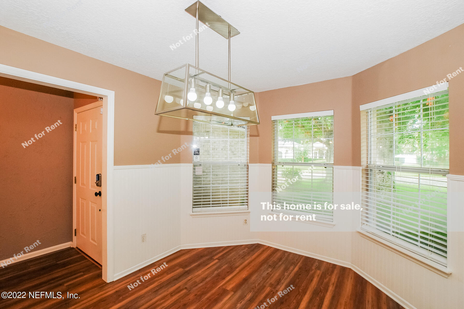 1760 Keswick Road St. Augustine, FL 32084 - Photo 13 of 27 a view of a room with window wooden floor and front door