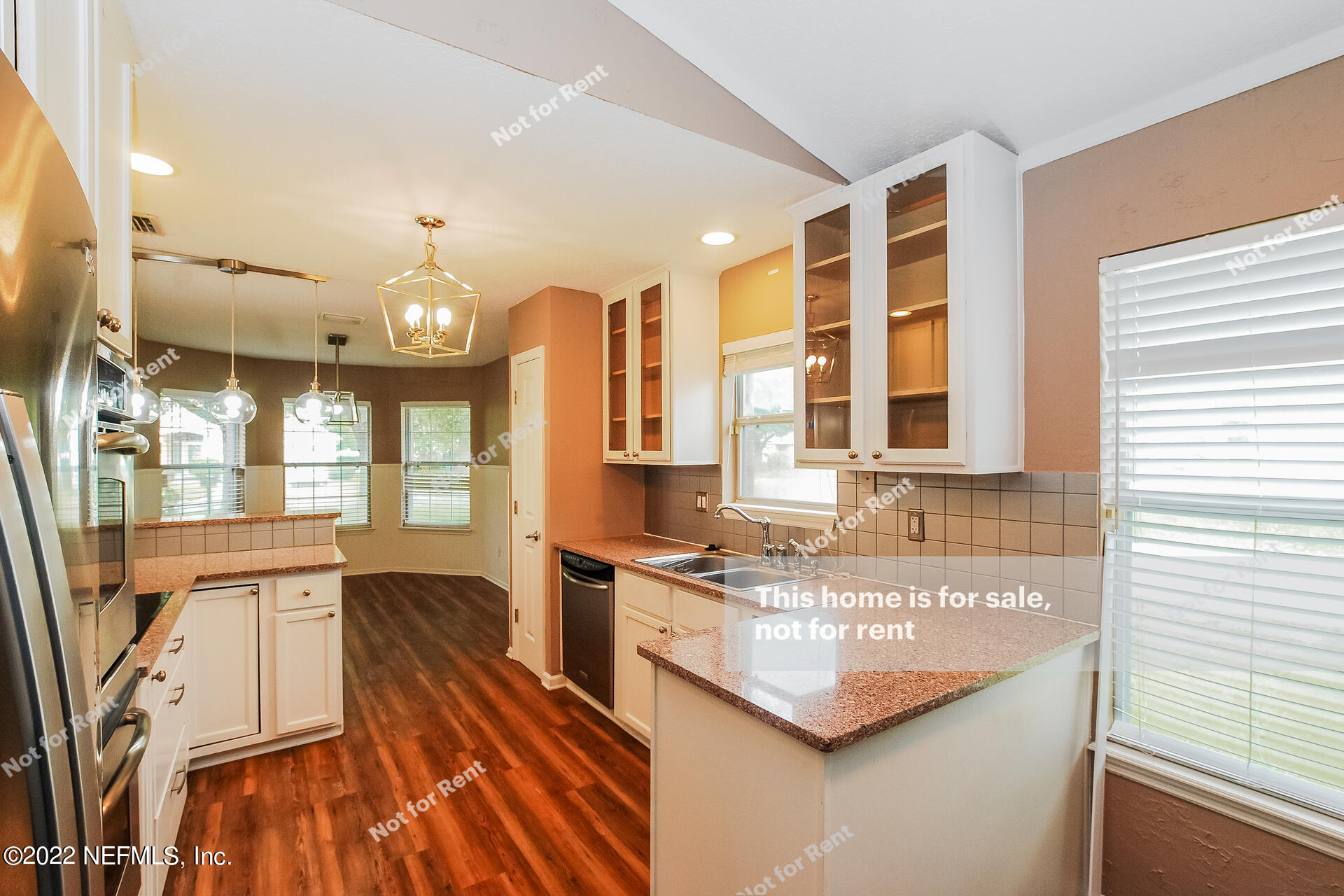 1760 Keswick Road St. Augustine, FL 32084 - Photo 14 of 27 a kitchen with stainless steel appliances granite countertop a stove and a sink