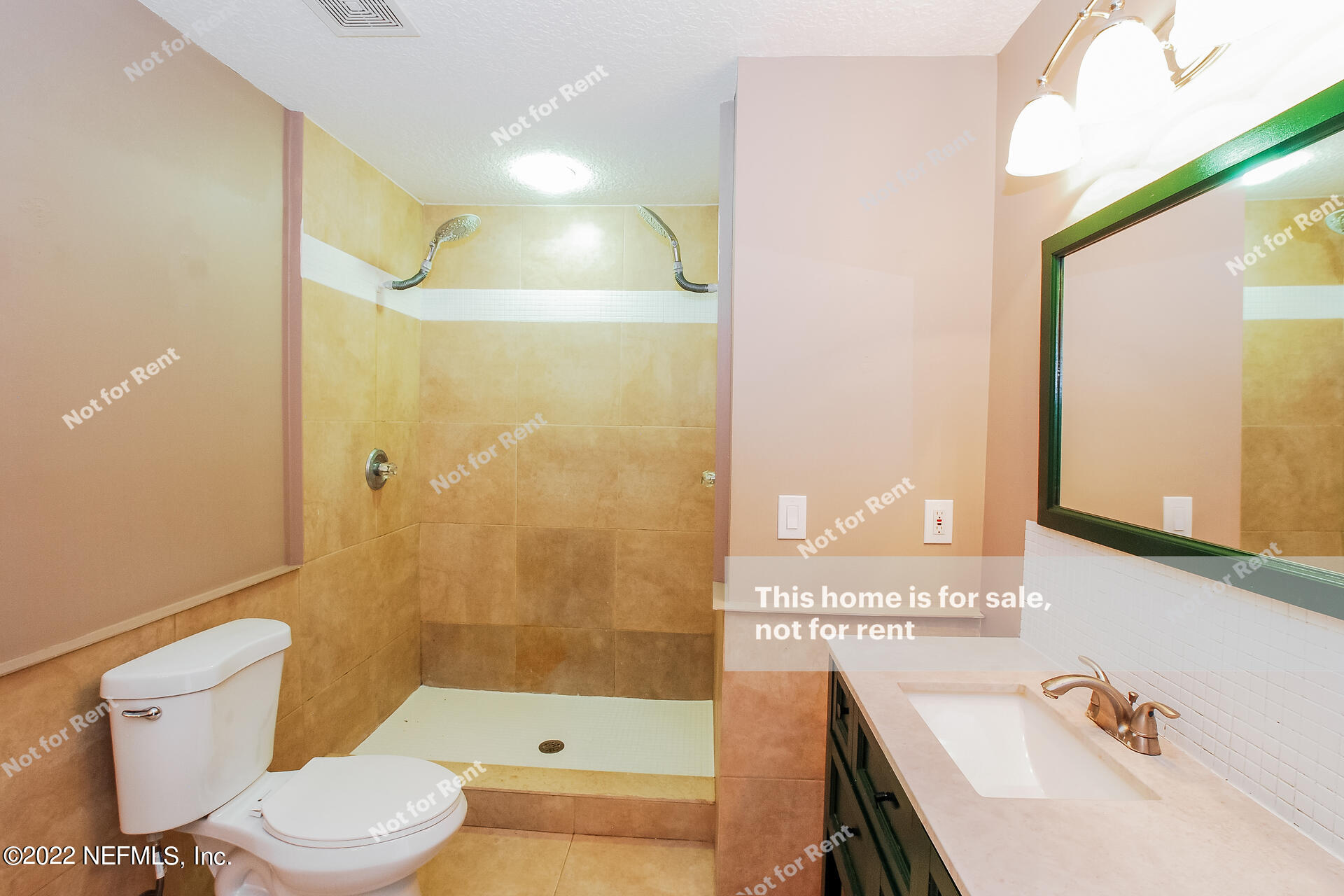1760 Keswick Road St. Augustine, FL 32084 - Photo 20 of 27 a bathroom with a sink a toilet and shower
