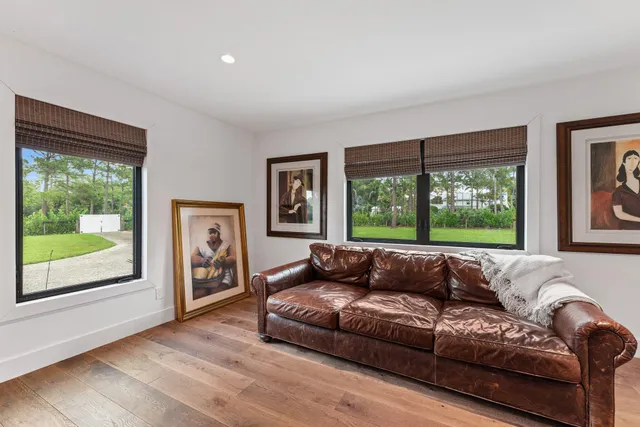 a bathroom with a toilet sink and shower