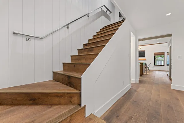 a view of a patio with a yard table and chairs