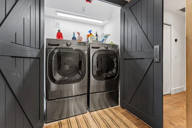 a view of a chairs and table in patio with a yard