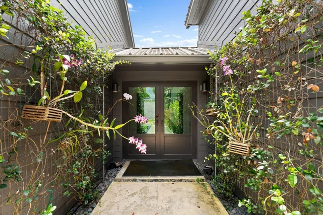 a kitchen with a table and chairs in it