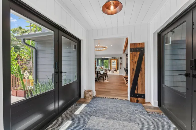 a kitchen with cabinets and steel stainless steel appliances