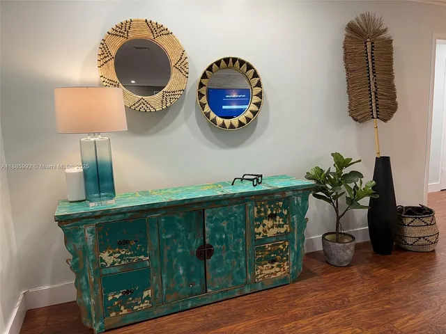 a vase of flowers sitting on a table