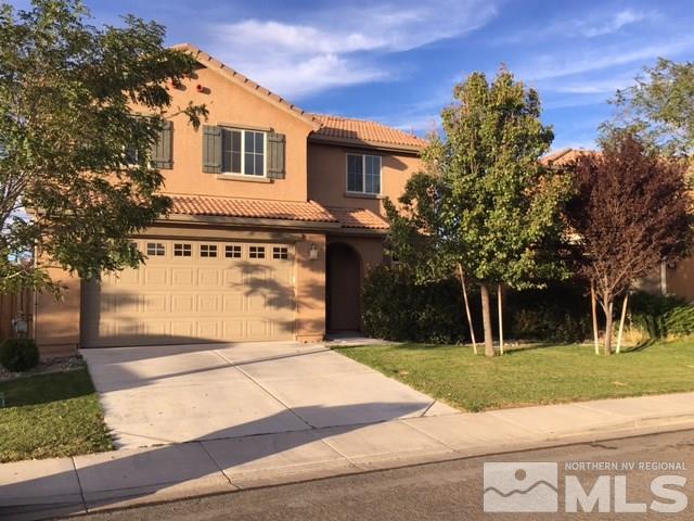 455 Pesaro Way Reno, NV 89521 - Photo 1 of 1 a front view of a house with a yard