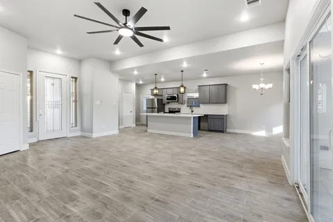 a view of a kitchen and a window