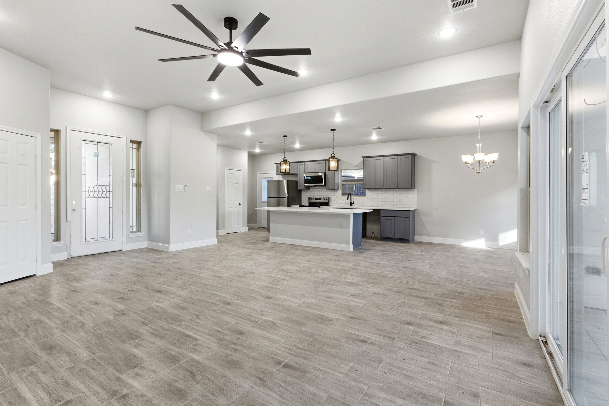 a view of a kitchen and a window
