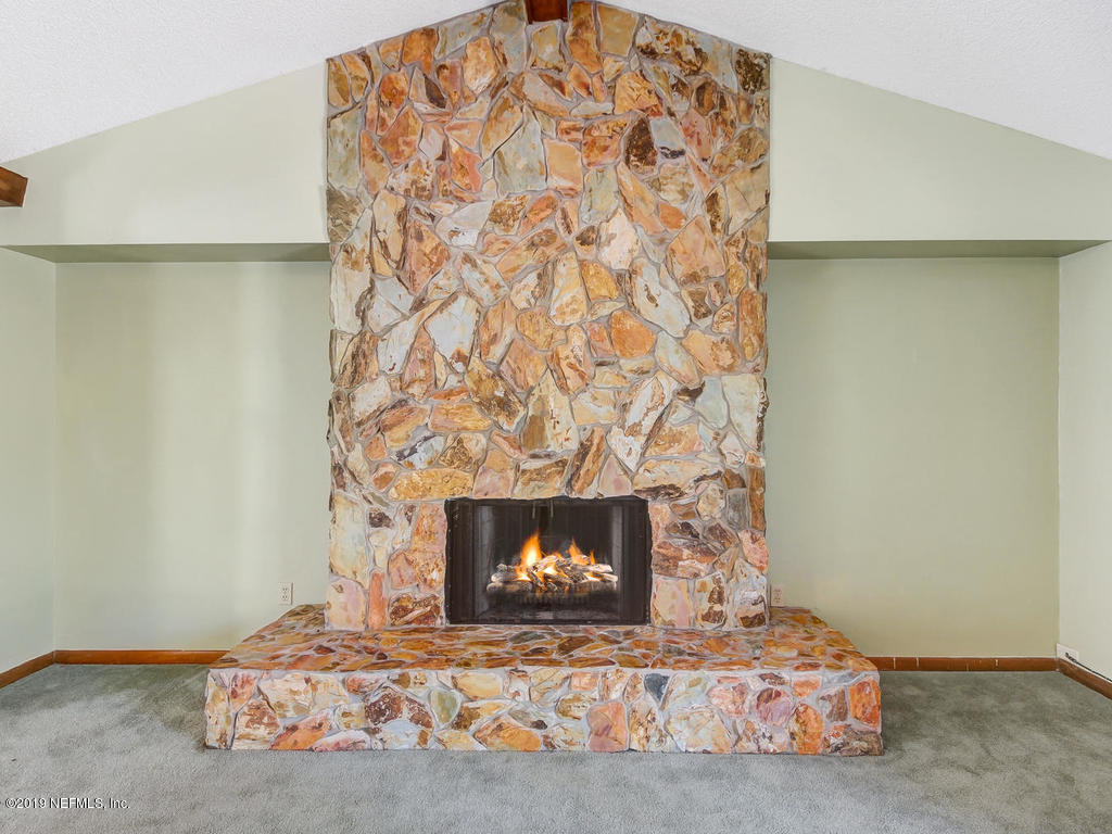 9052 Latimer Road West Jacksonville, FL 32257 - Photo 11 of 38 Stone Fireplace