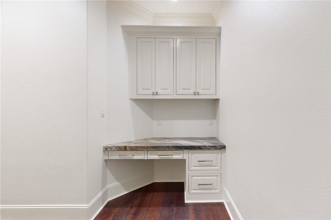 3317 Legacy Court Bryan, TX 77802 - Photo 23 of 28 a view of washer and dryer with kitchen countertops