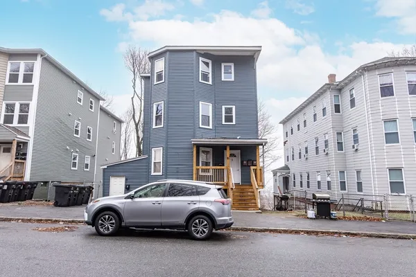 a car parked in front of a building