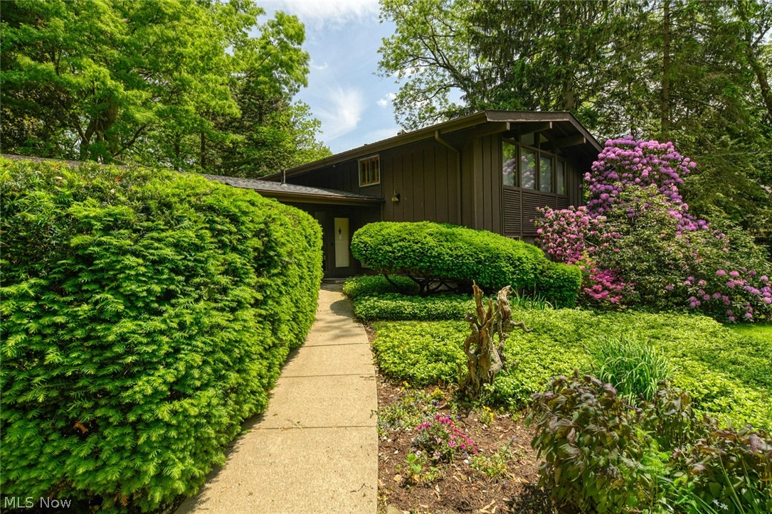 7324 Westview Road Kent, OH 44240 - Photo 1 of 28 This cedar-sided Twin Lakes gem is peeking out from behind the lush landscaping.