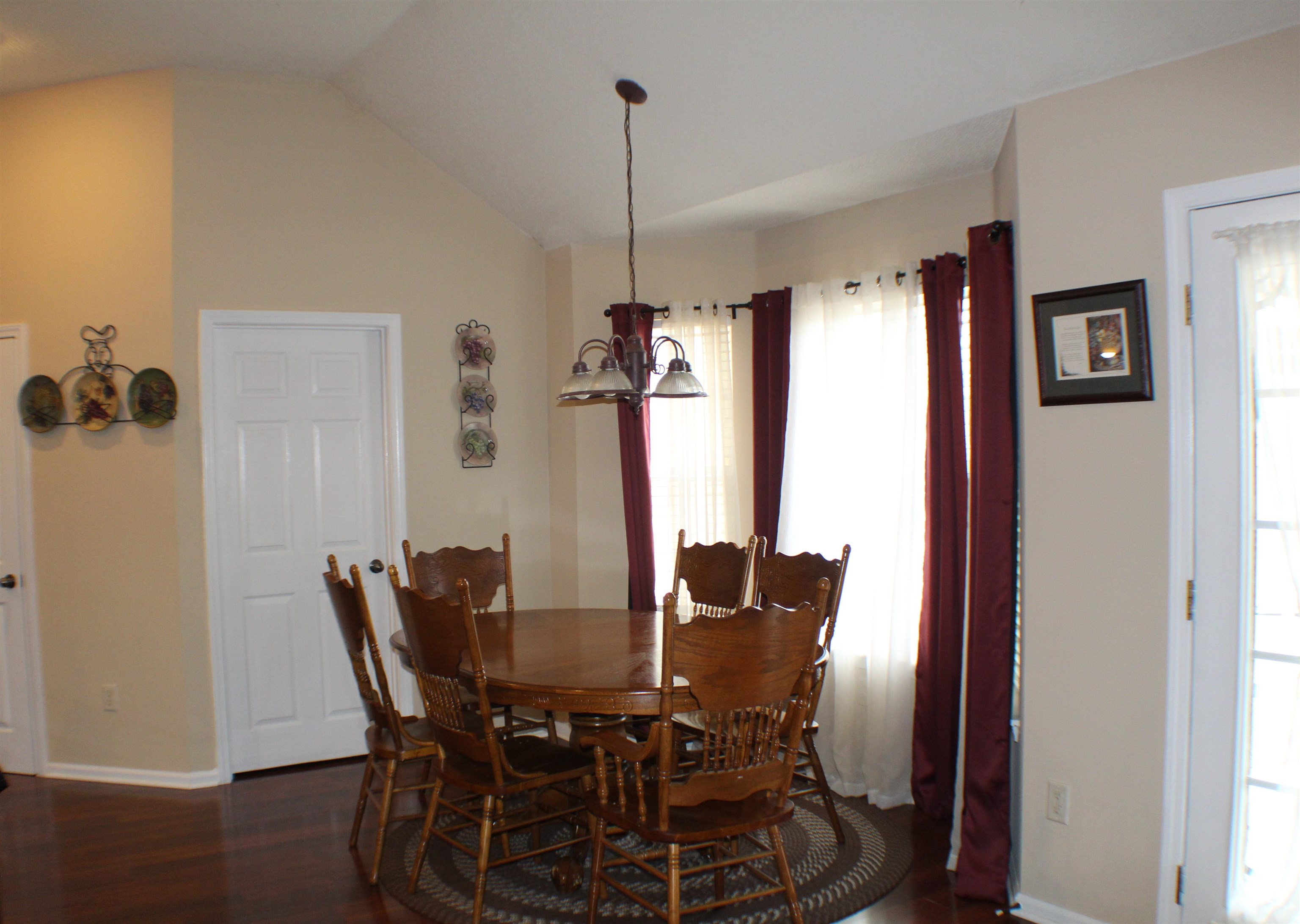 6442 Bending River Road Bartlett, TN 38135 - Photo 5 of 21 a view of a dining room with furniture and window