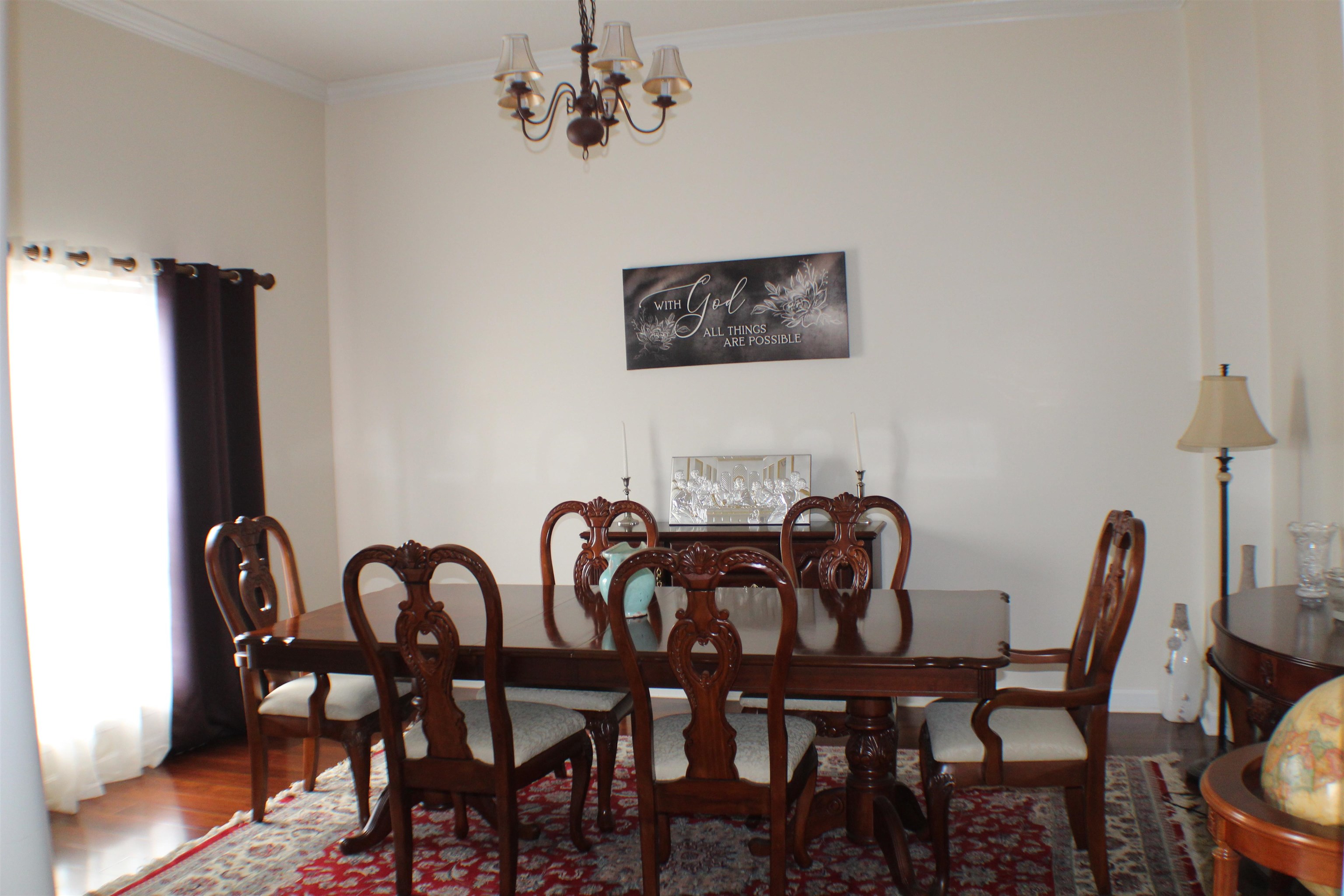 6442 Bending River Road Bartlett, TN 38135 - Photo 6 of 21 a view of a dining room with furniture and wooden floor