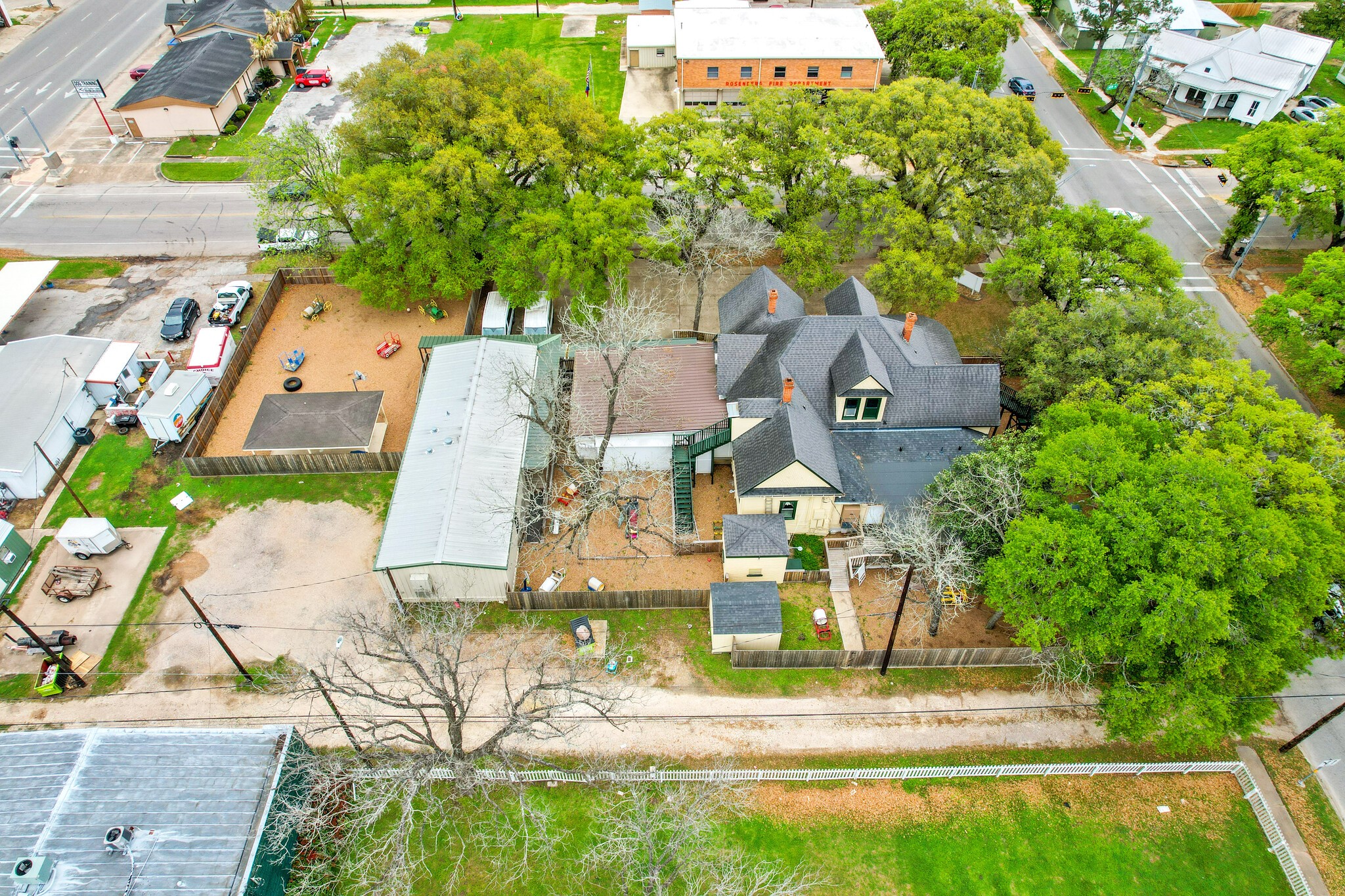 1030 4th Street Rosenberg, TX 77471 - Photo 38 of 39 an aerial view of residential houses with outdoor space