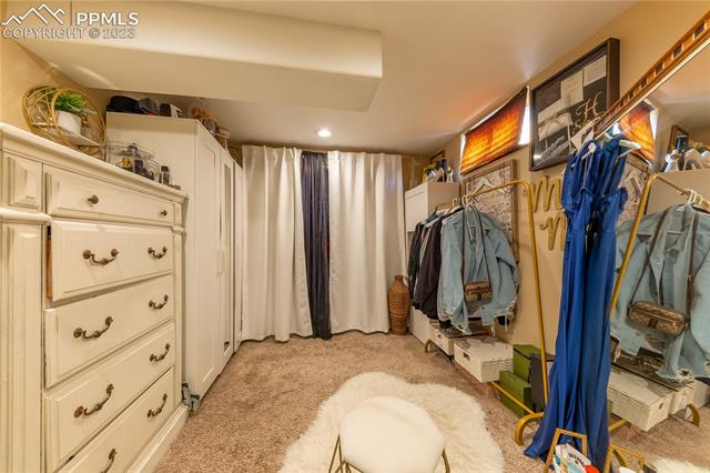 609 Placid Road Colorado Springs, CO 80910 - Photo 25 of 33 Master Closet and Dressi g Area