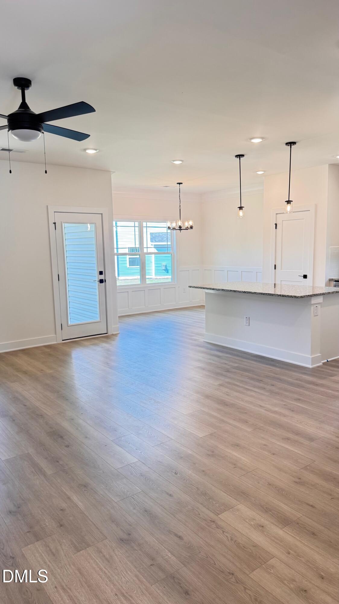 20 Streamline Court Lillington, NC 27546 - Photo 11 of 46 a view of a kitchen with a dishwasher and wooden floor