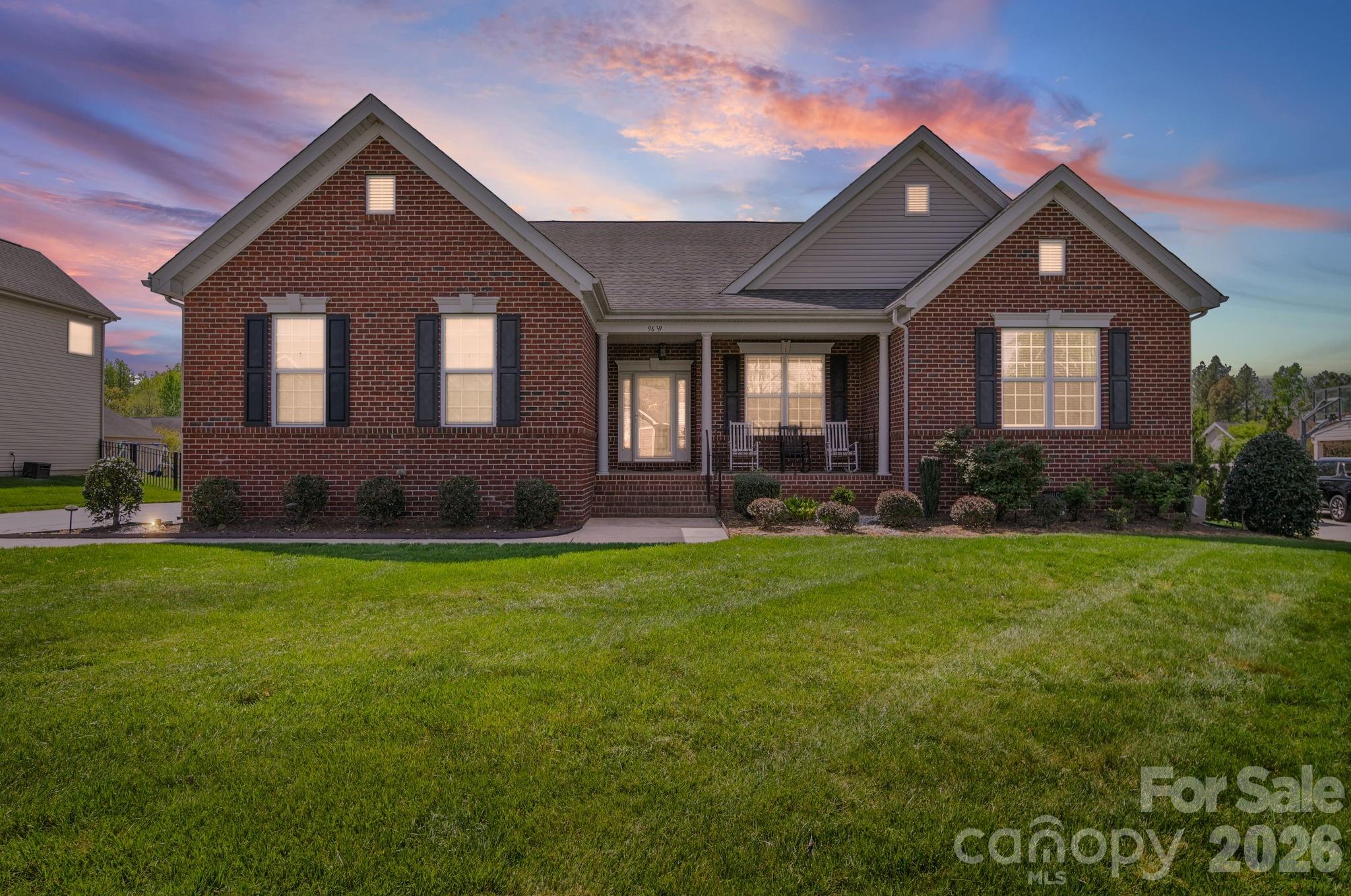 9639 Lockwood Road Concord, NC 28027 - Photo 1 of 33 a front view of a house with a yard