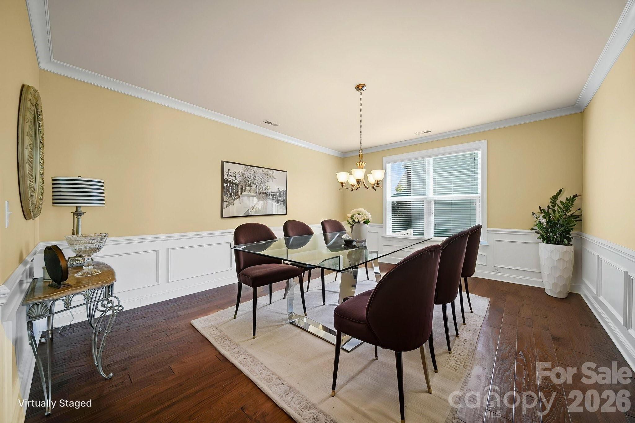 9639 Lockwood Road Concord, NC 28027 - Photo 13 of 33 a view of a dining room with furniture window and wooden floor