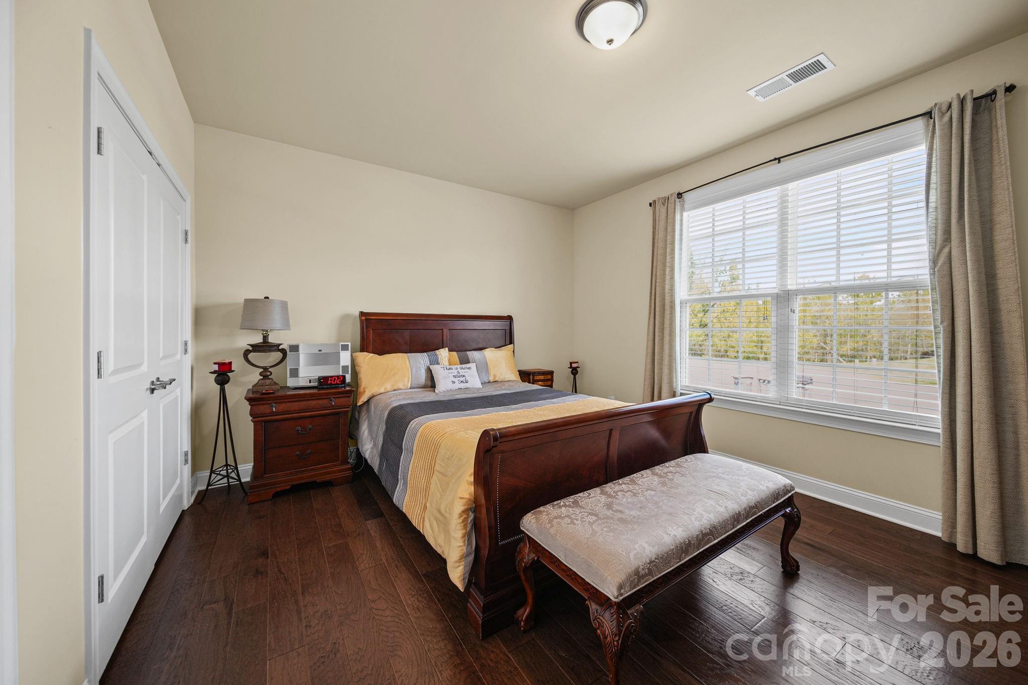 9639 Lockwood Road Concord, NC 28027 - Photo 18 of 33 a bedroom with a bed and a window