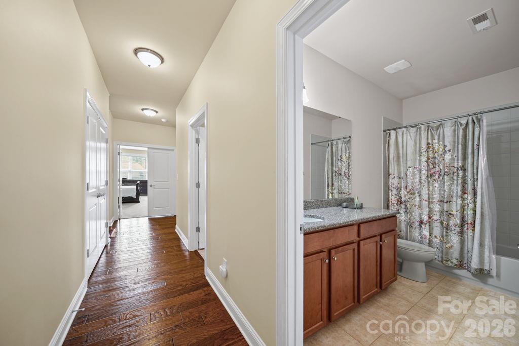 9639 Lockwood Road Concord, NC 28027 - Photo 19 of 33 a view of a bathroom from the hallway