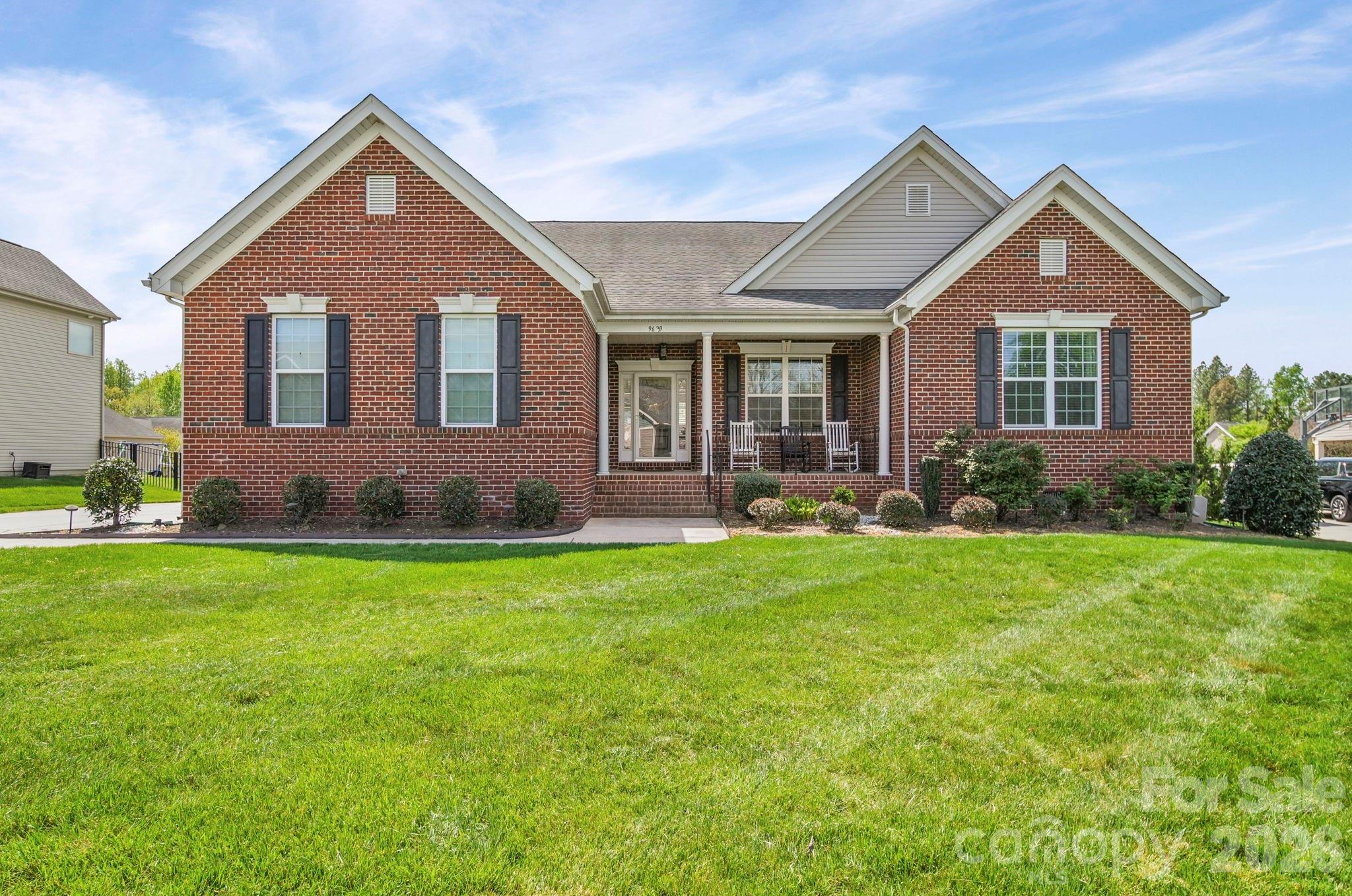 9639 Lockwood Road Concord, NC 28027 - Photo 2 of 33 a front view of a house with a yard