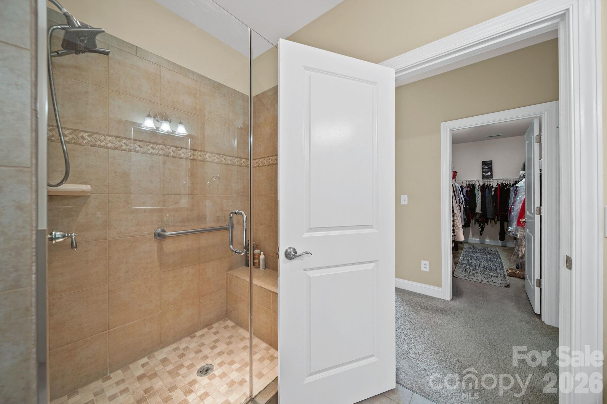 9639 Lockwood Road Concord, NC 28027 - Photo 23 of 33 a bathroom with a shower