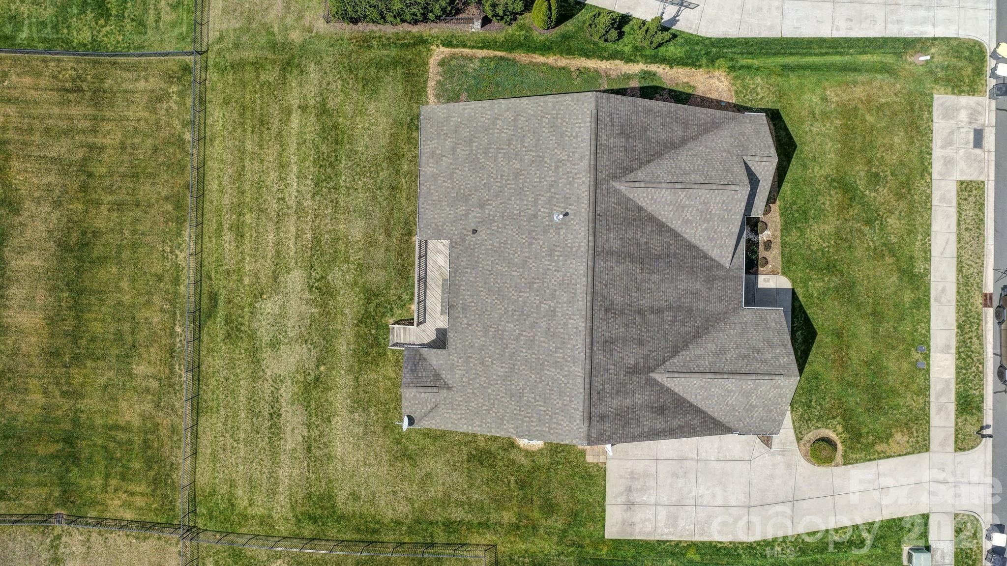9639 Lockwood Road Concord, NC 28027 - Photo 30 of 33 a aerial view of a house with a yard