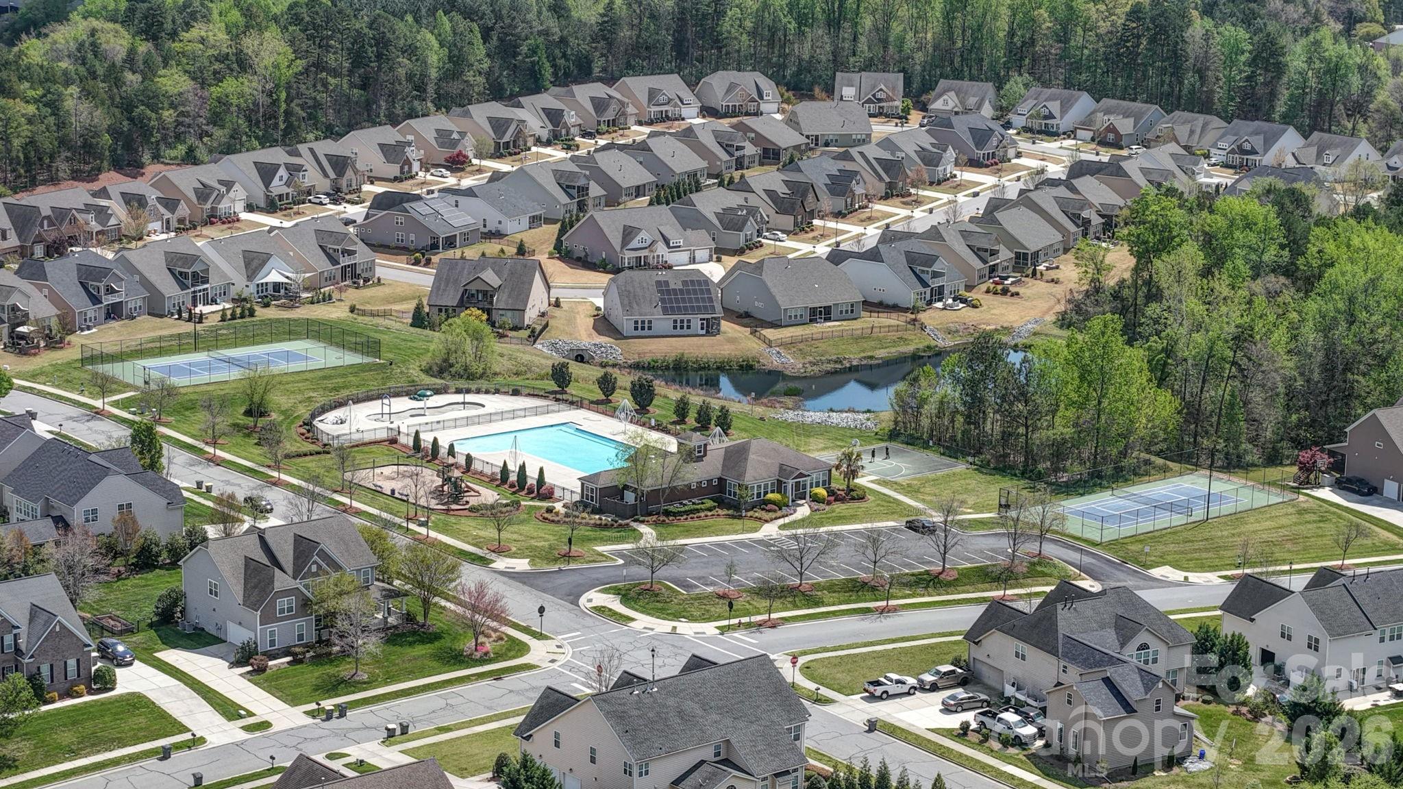 9639 Lockwood Road Concord, NC 28027 - Photo 33 of 33 an aerial view of residential houses with outdoor space