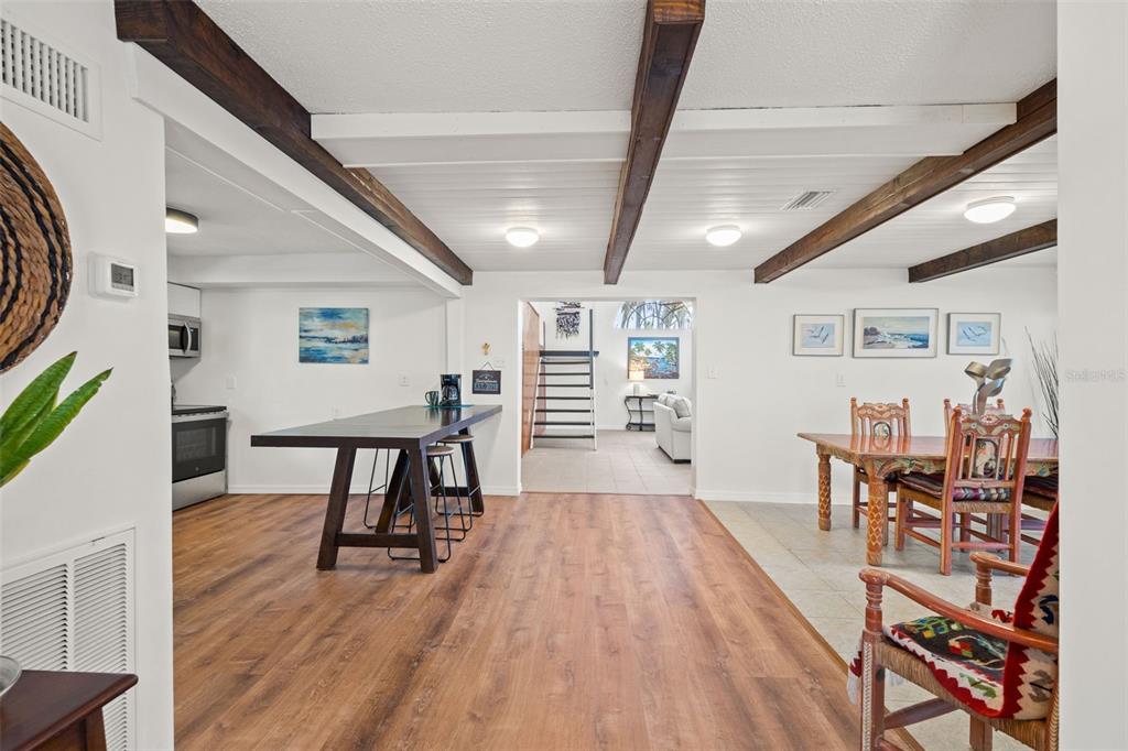 1524 Indian Bay Road Hernando Beach, FL 34607 - Photo 14 of 48 a view of a dining room with furniture and wooden floor
