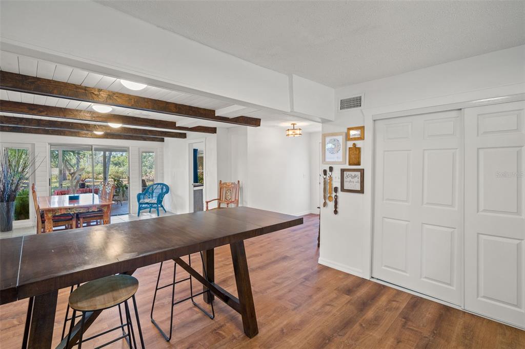 1524 Indian Bay Road Hernando Beach, FL 34607 - Photo 16 of 48 a view of a dining table and chairs in the kitchen