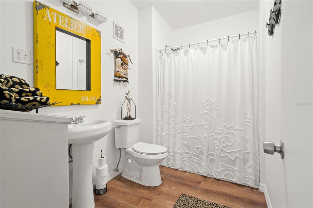 1524 Indian Bay Road Hernando Beach, FL 34607 - Photo 19 of 48 a bathroom with a sink toilet and shower