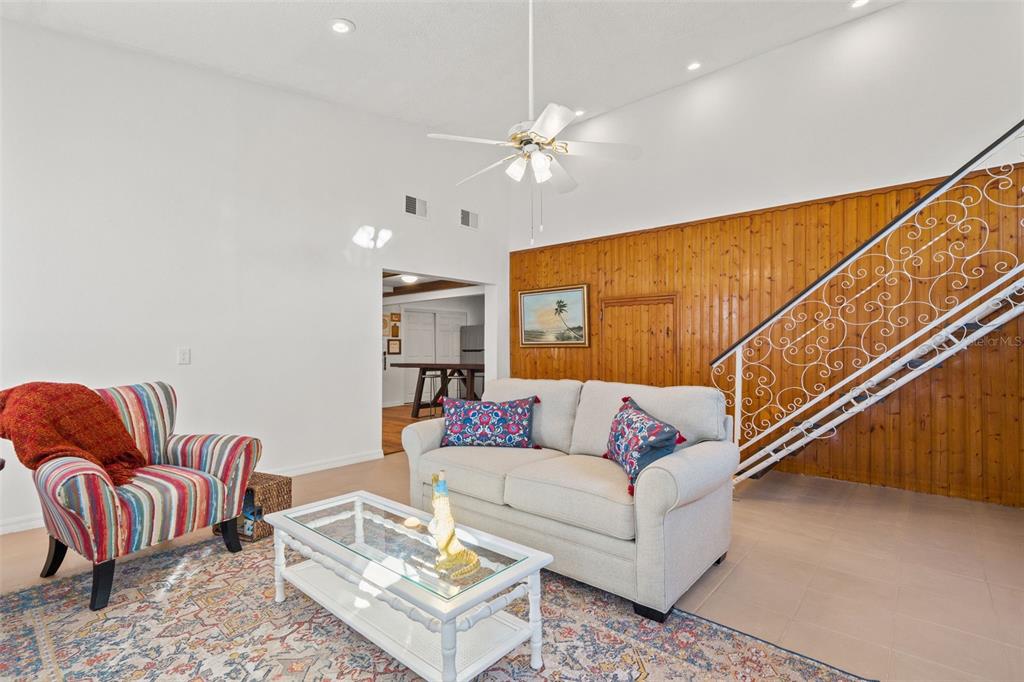 1524 Indian Bay Road Hernando Beach, FL 34607 - Photo 7 of 48 a living room with furniture and a ceiling fan