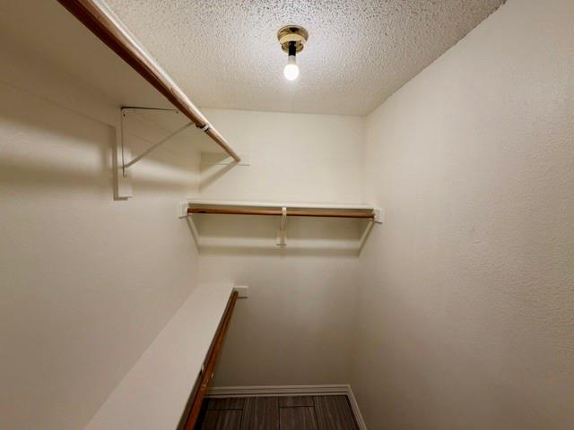 2604 Crix Lane Fort Worth, TX 76140 - Photo 6 of 13 Walk-in closet with ample storage solutions