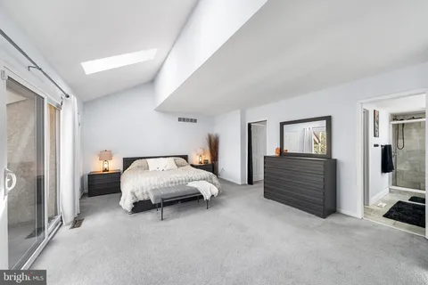 a view of balcony with wooden floor and fence