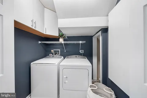 a bedroom with a bed and furniture